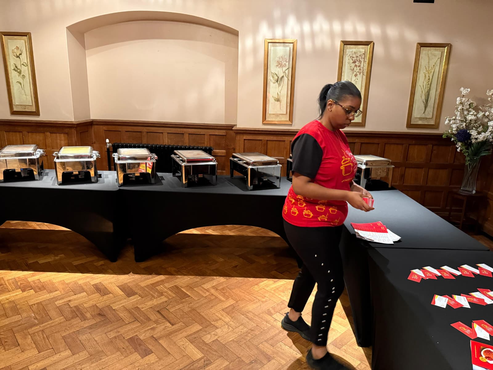 Catering spread from Rae's Food House with shared dishes on a long table